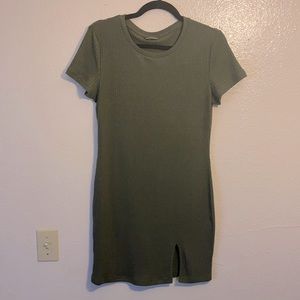 Like new; short green dress, with side slit